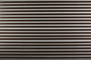 Arkaplan olarak ahşap tahtalar olan gri duvar dokusu. Basit tasarım