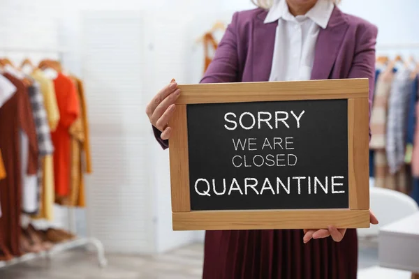 Business Owner Holding Sign Text Sorry Closed Quarantine Boutique Primo — Foto Stock