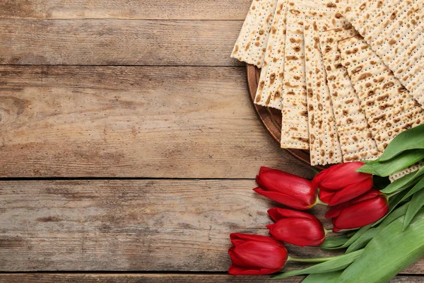 Tasty Matzos Flowers Wooden Table Flat Lay Space Text Passover — Stock Photo, Image