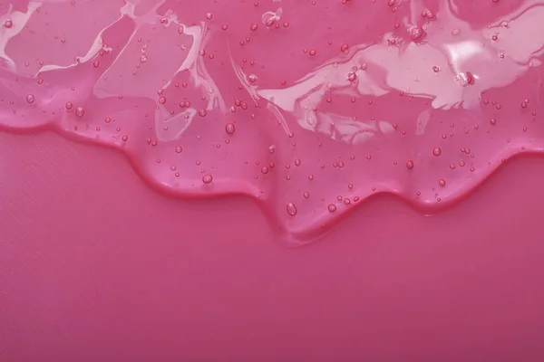 Чистый Прозрачный Косметический Гель Розовом Фоне Вид Сверху — стоковое фото