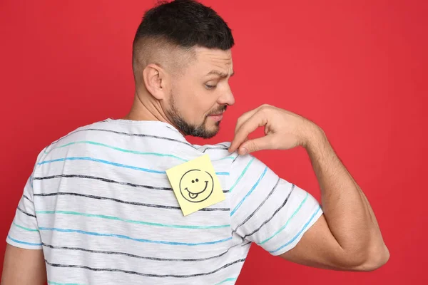 Man Smiling Face Sticker Back Red Background April Fool Day — Stock Photo, Image