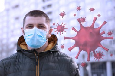 Coronavirüs salgını sırasında dışarıda maske takan adam.