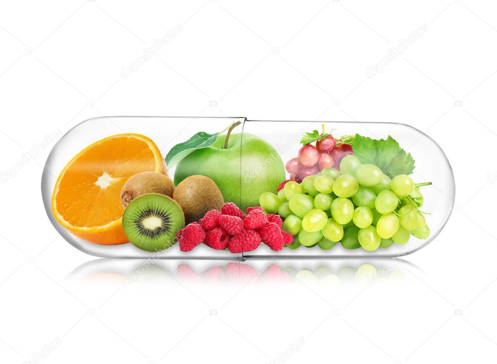 Transparent capsule with different fruits and berries rich in vitamins on white background