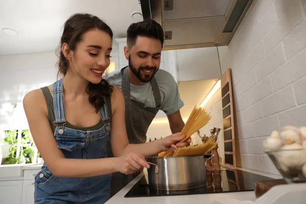 Lovely Young Couple Cooking Pasta Together Kitchen — Stock Photo, Image