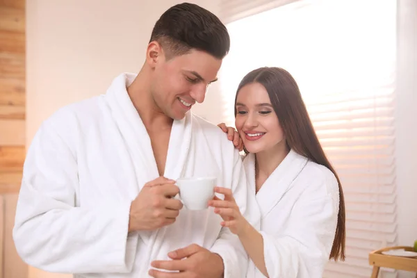 Happy Couple Bathrobes Coffee Bedroom — Stock Photo, Image