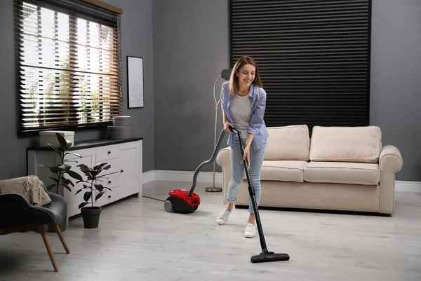 Young Woman Using Vacuum Cleaner Home — Stock Photo, Image