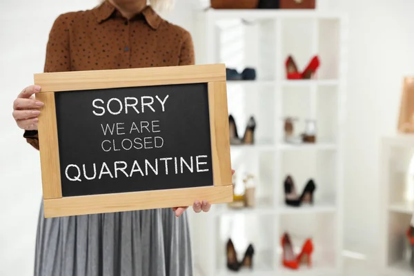 Business Owner Holding Sign Text Sorry Closed Quarantine Boutique Primo — Foto Stock