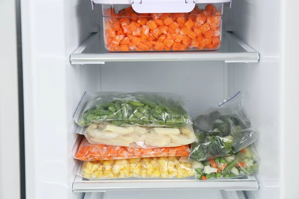 Plastic Bags Containers Different Frozen Vegetables Refrigerator — Stock Photo, Image