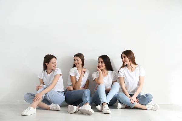 Beautiful Young Ladies Jeans White Shirts Light Wall Indoors Woman — Stock Photo, Image