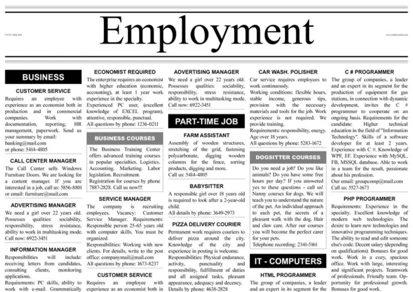 Job search concept. Newspaper full of advertisements