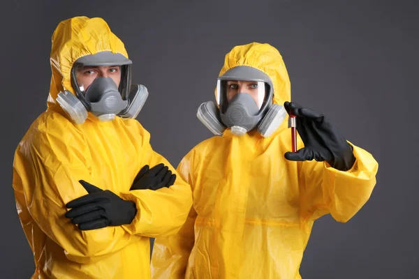 People Chemical Protective Suits Blood Sample Grey Background Virus Research — Stock Photo, Image