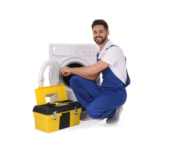 Klempner Repariert Waschmaschine Auf Weißem Hintergrund — Stockfoto