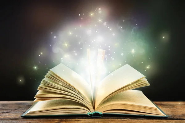 Magic Light Emanating Open Old Book Table — Stock Photo, Image