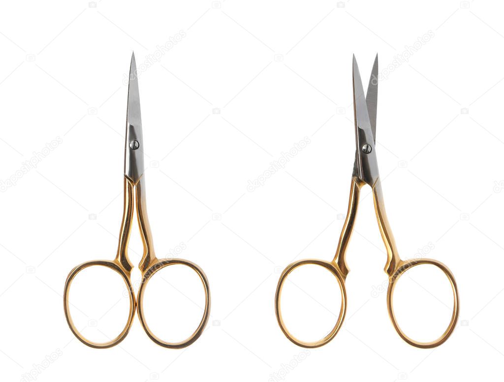 Manicure scissors on white background, top view