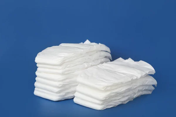 Stack Baby Diapers Blue Background — Stock Photo, Image