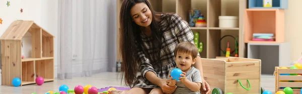 Young Nanny Cute Little Baby Playing Toys Home Banner Design — Stock Photo, Image