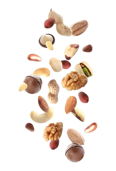 Different Nuts Falling White Background — Stock Photo, Image