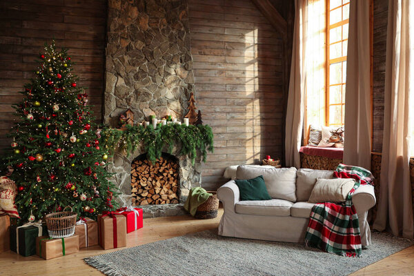 Festive interior with decorated Christmas tree and fireplace