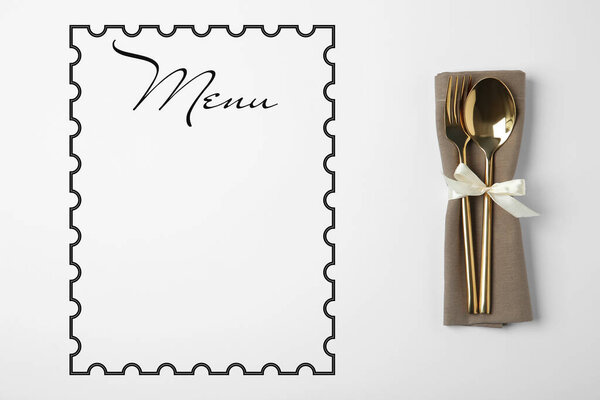 Cutlery set and empty menu on white background, top view. Space for text