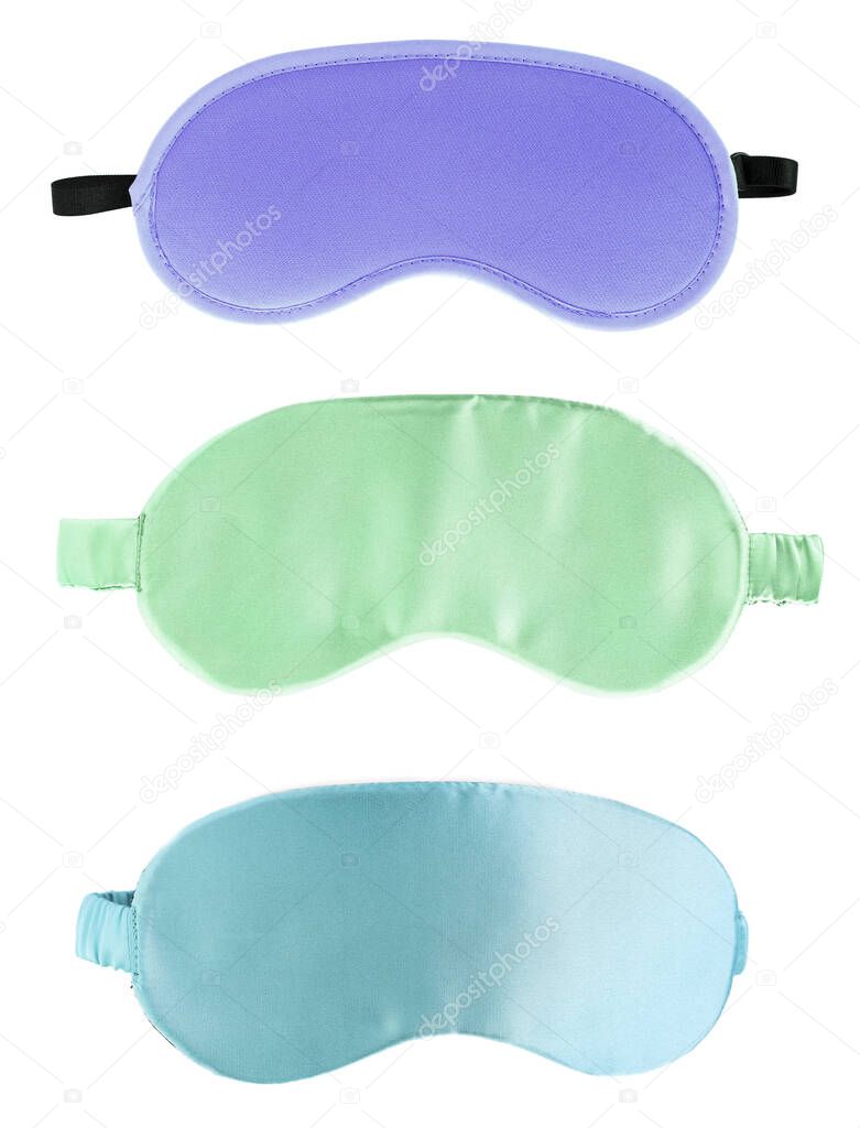 Set of different sleeping eye masks on white background, top view. Bedtime