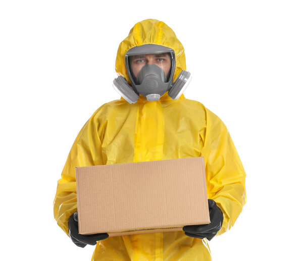 Man wearing chemical protective suit with cardboard box on white background. Prevention of virus spread