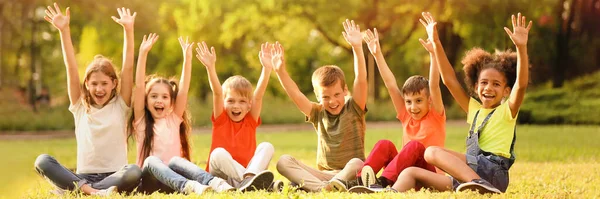 Cute Little Children Sitting Grass Outdoors Sunny Day Banner Design — Stock Photo, Image