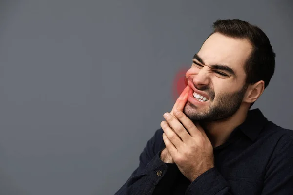 Young Man Suffering Toothache Grey Background Space Text — Stock Photo, Image