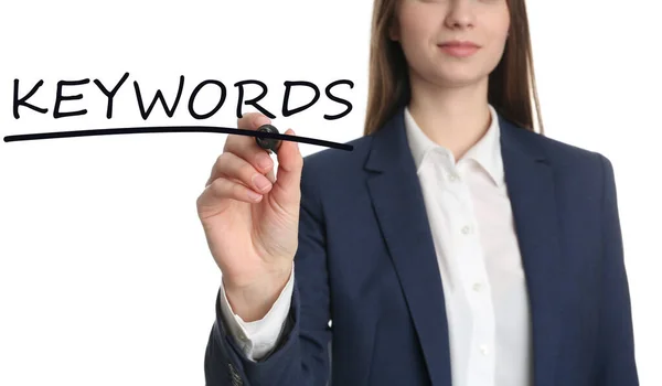 Woman Writing Word Keywords Transparent Board White Background Closeup — Stock Photo, Image
