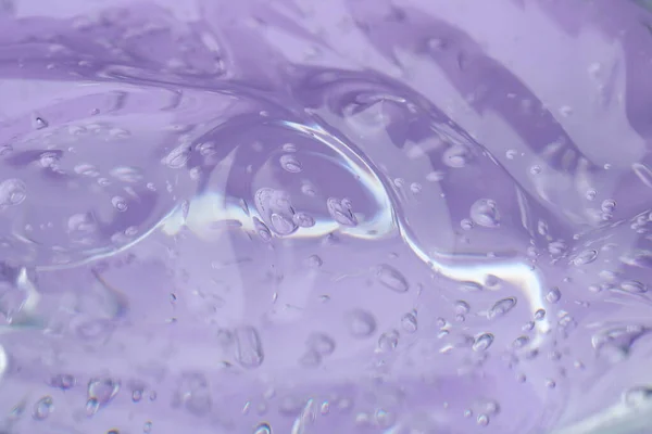 Gel Cosmético Transparente Puro Sobre Fondo Lila Primer Plano —  Fotos de Stock