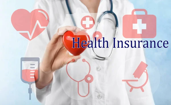 Phrase Health Insurance Icons Doctor Heart Model Light Background — Stock Photo, Image