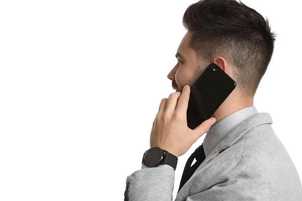 Ung Affärsman Talar Smartphone Mot Vit Bakgrund — Stockfoto