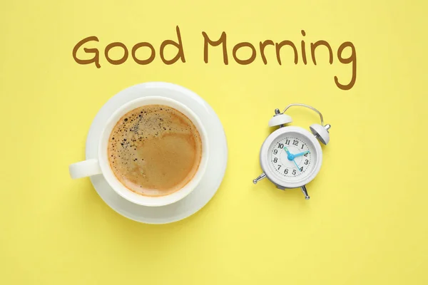 Cup Aromatic Coffee Alarm Clock Yellow Background Flat Lay Good — Stock Photo, Image