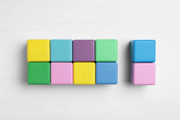 Flat Lay Composition Colorful Cubes White Wooden Background Pareto Principle — Stock Photo, Image