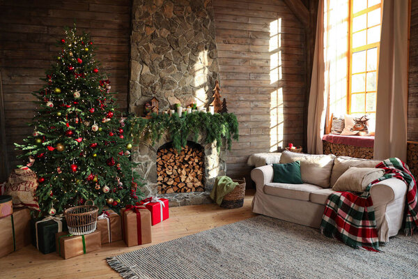 Festive interior with decorated Christmas tree and fireplace