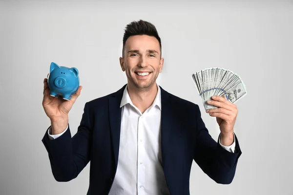 Happy Man Cash Money Piggybank Light Grey Background — Stock Photo, Image