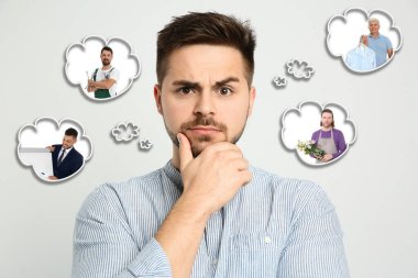Puzzled man thinking about probable profession on light bakground clipart