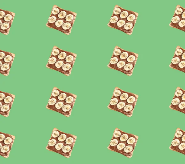 Sada Lahodného Opékaného Chleba Čokoládovou Pomazánkou Banánem Zeleném Pozadí Pohled — Stock fotografie