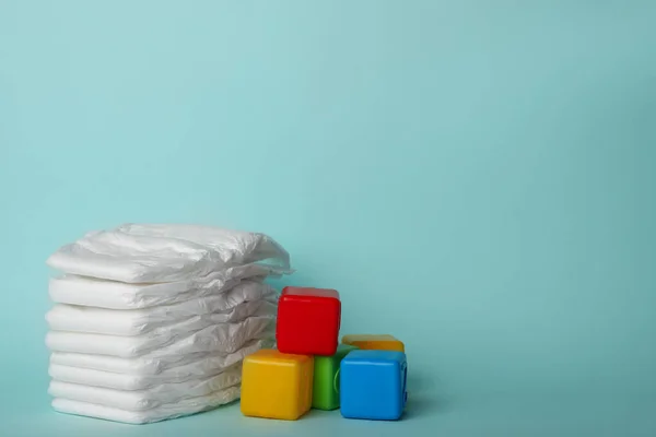 Pañales Cubos Plástico Sobre Fondo Azul Claro Espacio Para Texto —  Fotos de Stock