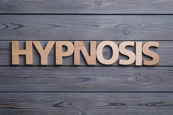 Hipnosis Palabra Sobre Fondo Madera Plano — Foto de Stock