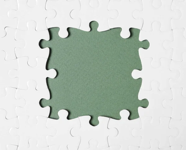 Cadre Réalisé Avec Des Pièces Puzzle Blanc Sur Fond Gris — Photo