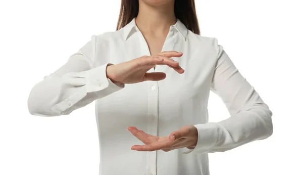 Geschäftsfrau Hält Etwas Auf Weißem Hintergrund Nahaufnahme — Stockfoto