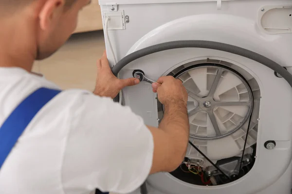 Professional Plumber Repairing Broken Washing Machine Closeup — Stock Photo, Image