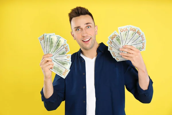 Emotional Man Cash Money Yellow Background — Stock Photo, Image