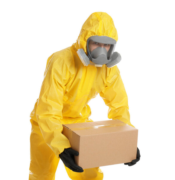 Man wearing chemical protective suit with cardboard box on white background. Prevention of virus spread