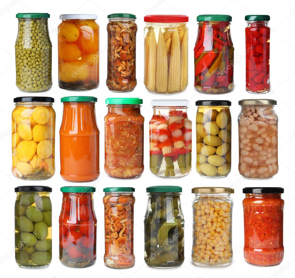 Set of jars with pickled vegetables, sauces and mushrooms on white background