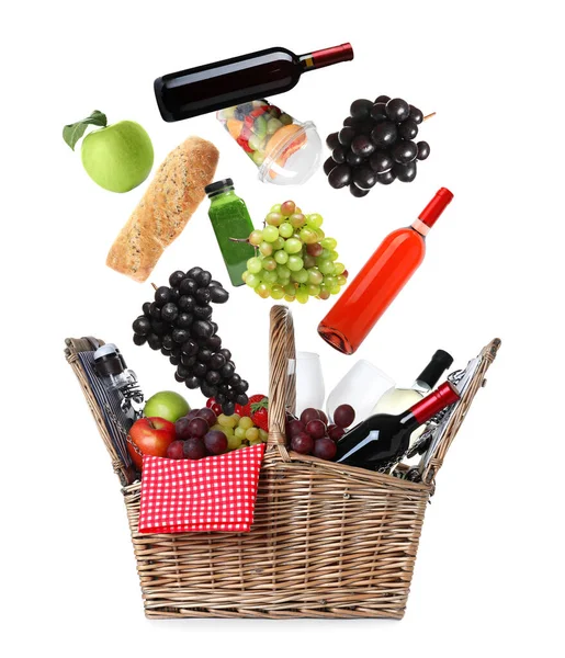 Different Products Falling Picnic Basket White Background — Stock Photo, Image