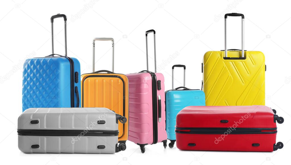 Set of different stylish suitcases for travelling on white background