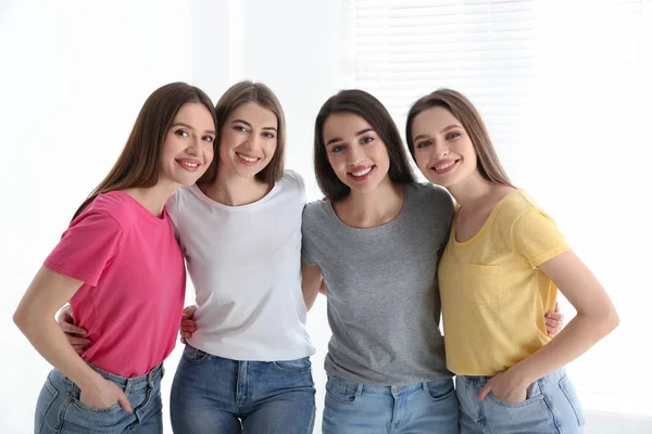 Beautiful Young Ladies Jeans Colorful Shirts Indoors Woman Day — Stock Photo, Image