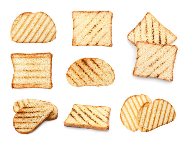 Set of toasted bread slices on white background