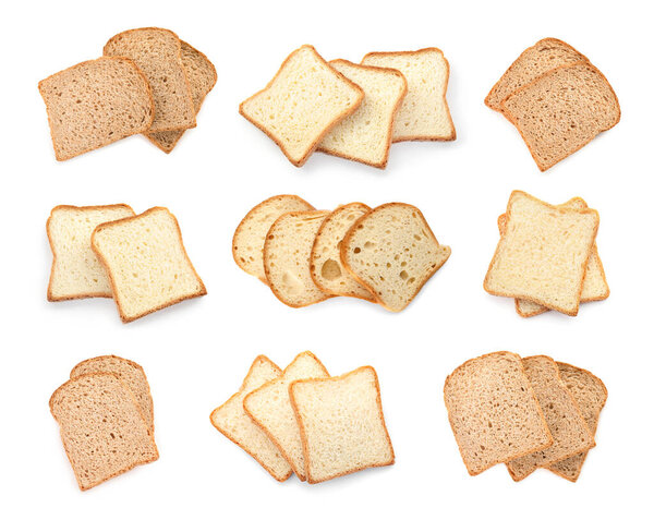 Set of bread slices on white background, top view